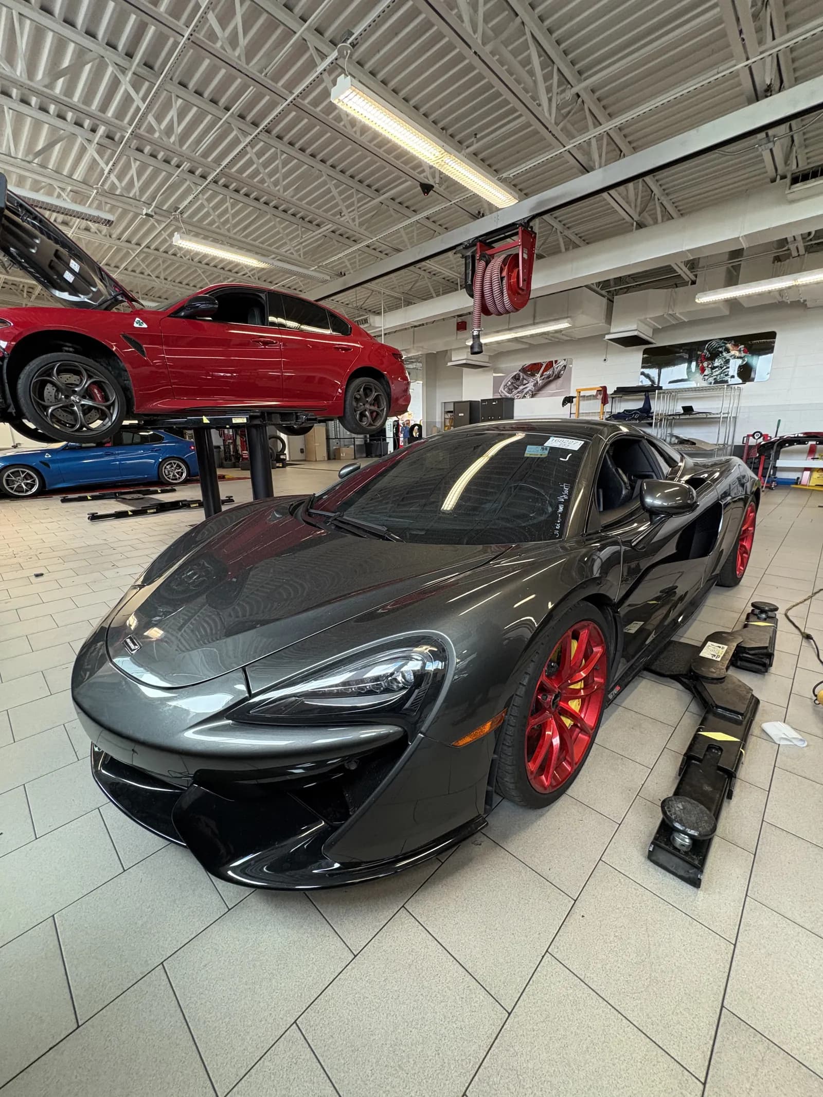 Black Porsche 911 ceramic tint at dealership